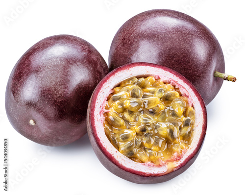 Dark purple passion fruits and half of fruit on white background.