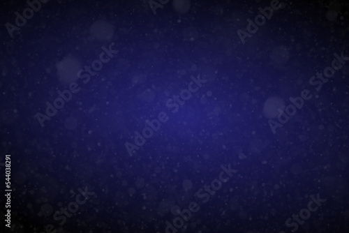 Blue christmas atmosphere background. Abstract Christmas background with snowflakes. Beautiful glowing snow Christmas background with snow flakes