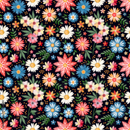 Colorful embroidery pattern with flowers. Seamless vector design. Fashion print for fabric.