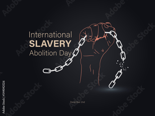 International Day for the Abolition of Slavery. Silhouette of hand in fist with chain intertwined and breaking it on dark background.
