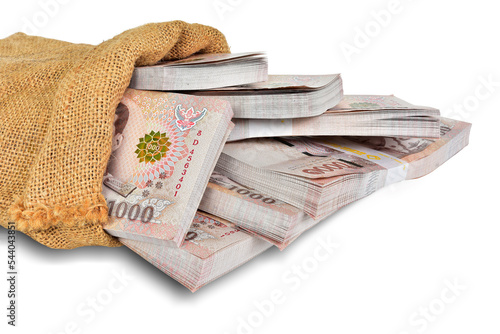 Fotografia, Obraz Banknotes of one thousand baht in brown sack bag.