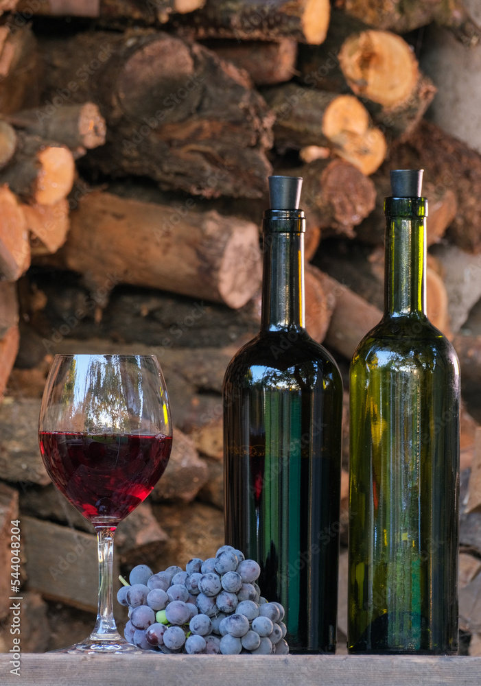 Tasting red wine from Isabella grapes at the winery. Sommelier pouring