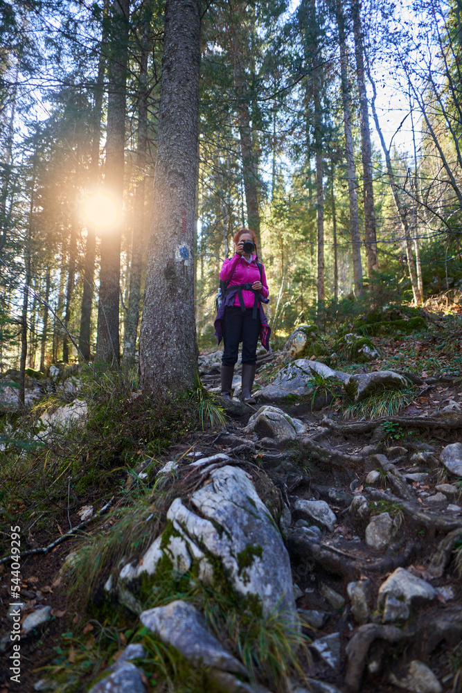Woman hiker with camera Woman hiker with camera