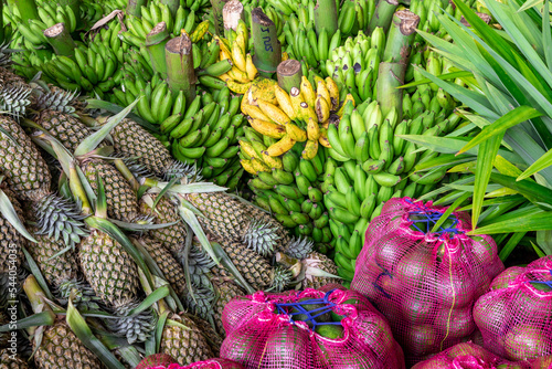 Green bananas for sale at big food market of Dambulla, Sri Lanka. photo