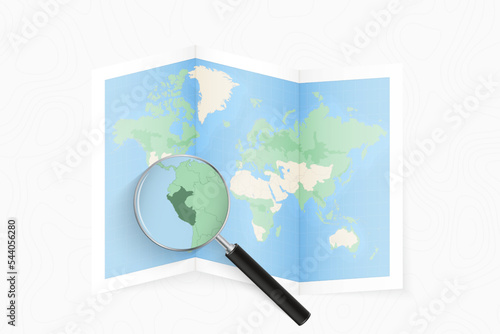 Enlarge Peru with a magnifying glass on a folded map of the world.