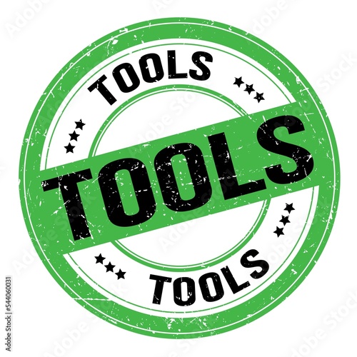 Foto TOOLS text written on green-black round stamp sign