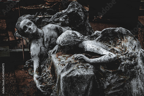 sepulchral sculpture of two angels in agony, monumental cemetery