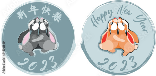 Variants of the symbol of the New Year 2023 - kissing Rabbits. The emblema is placed in the circle and subscribed in English and Chinese