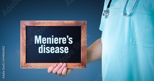 Meniere's disease. Doctor shows sign/board with wooden frame. Background blue photo