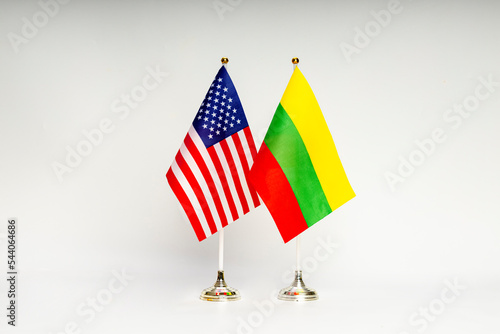 State flags of the USA and Lithuania on a light background.