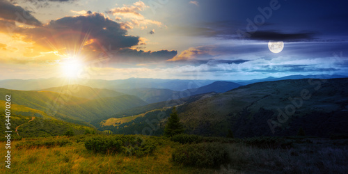 view in to the mountain valley at twilight. day and night time change concept. beautiful summer landscape of trascarpathia with forested hills and grassy alpine meadows beneath a sky with sun and moon photo