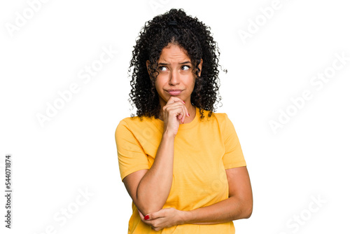 Young cute brazilian woman isolated looking sideways with doubtful and skeptical expression.