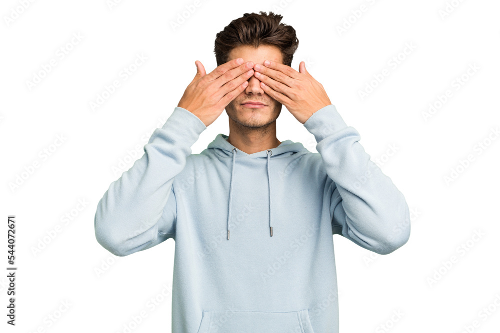 Young caucasian handsome man isolated afraid covering eyes with hands.