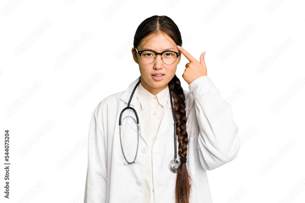 Young doctor asian woman isolated showing a disappointment gesture with forefinger. Young doctor asian woman isolated showing a disappointment gesture with forefinger.
