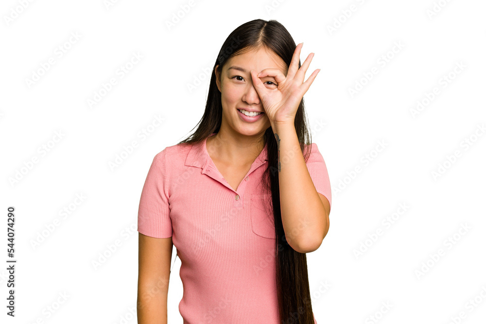 Young Asian woman isolated showing okay sign over eyes Young Asian woman isolated showing okay sign over eyes
