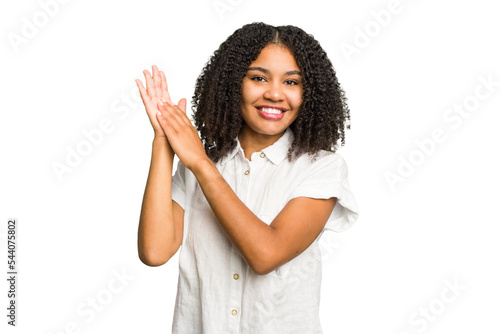 Young african american woman isolated feeling energetic and comfortable, rubbing hands confident.