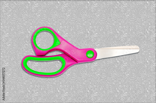 school or office scissors isolated on texture background
