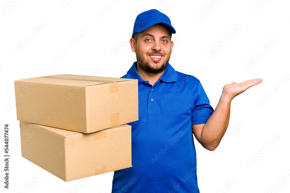 Delivery caucasian man isolated showing a copy space on a palm and holding another hand on waist. Delivery caucasian man isolated showing a copy space on a palm and holding another hand on waist.