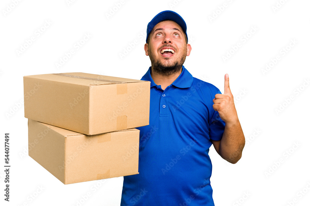 Delivery caucasian man isolated pointing upside with opened mouth. Delivery caucasian man isolated pointing upside with opened mouth.