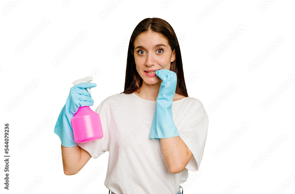 Young cleaner woman isolated biting fingernails, nervous and very anxious.