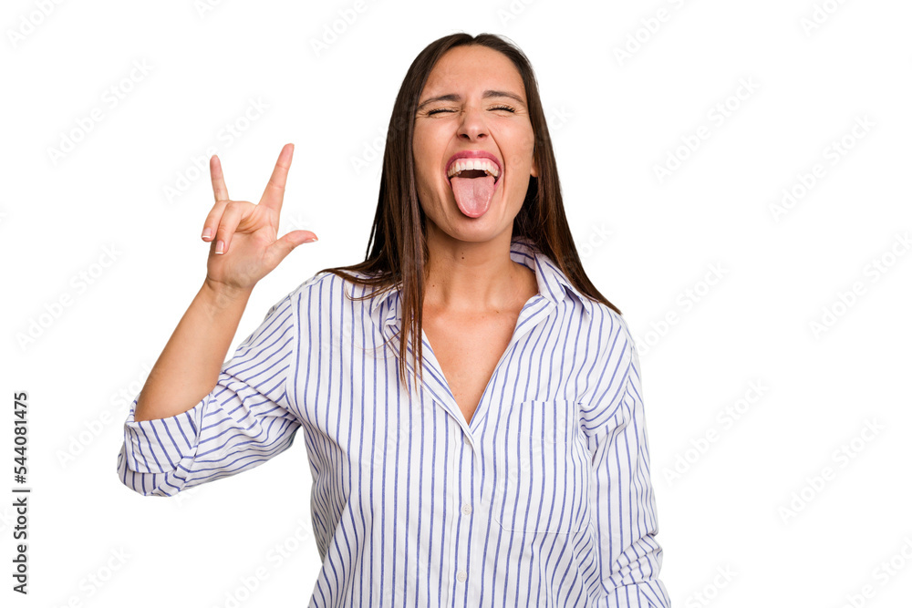 Young caucasian cute woman isolated showing rock gesture with fingers Young caucasian cute woman isolated showing rock gesture with fingers
