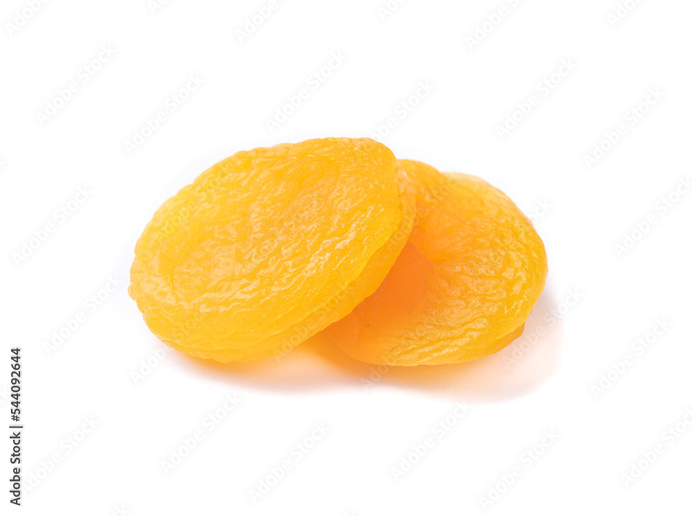 A pair of dried apricots isolated over white background A pair of dried apricots isolated over white background