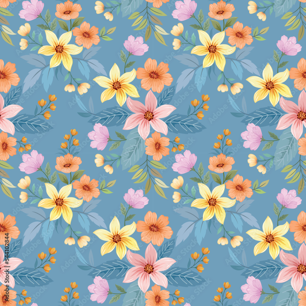 Colorful blooming flowers on blue color background seamless pattern for fabric  textile  wallpaper.