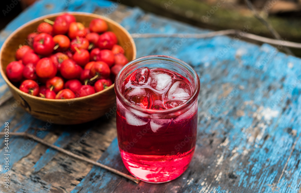 Glass of sour cherry juice with fresh red cherries, Cherry juice, on wood background, red drink, High vitamin C and antioxidant fruits. Glass of sour cherry juice with fresh red cherries, Cherry juice, on wood background, red drink, High vitamin C and antioxidant fruits.