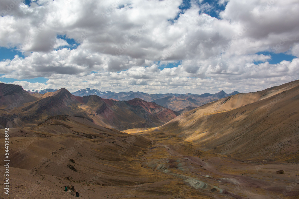 Fototapeta premium Rainbow Mountain Valley, Peru, with views of the mountains. 
