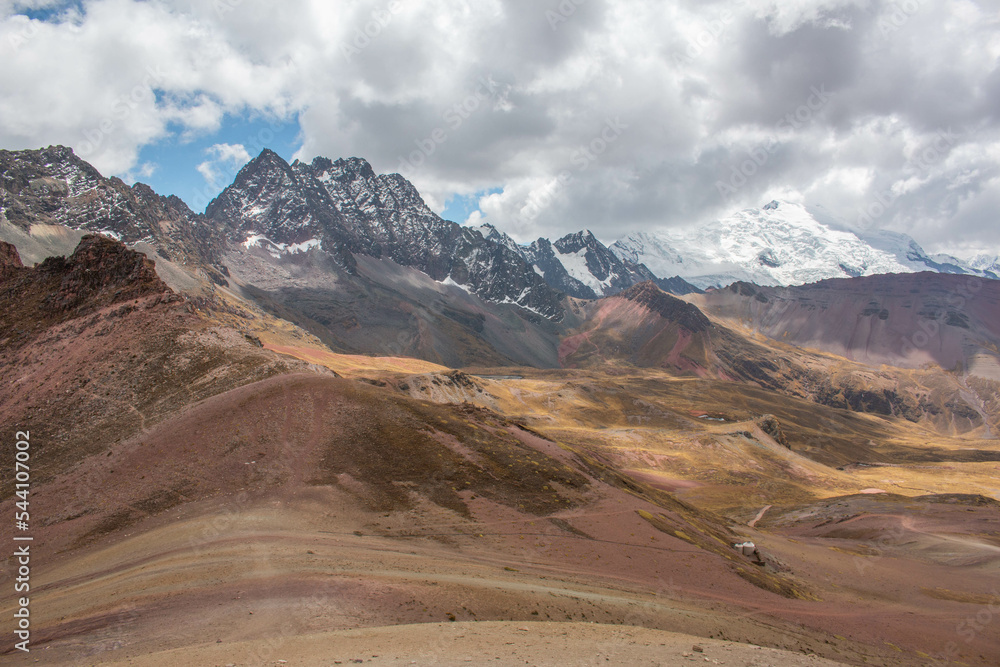 Rainbow Mountain Valley with view of the snow-capped mountains, Peru. 