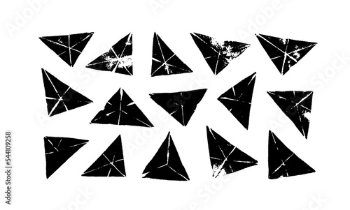 Triangle stamps vector collection. Geometric shapes isolated on white background. Hand drawn grunge triangles. Sketch design elements with grunge texture. Black and white illustration.