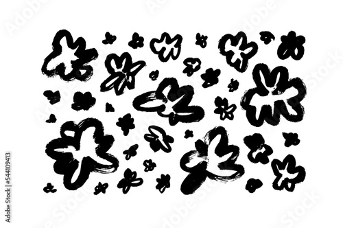 Childish style flowers elements isolated on white background. Abstract black botanical elements. Brush drawn floral silhouettes. Graphic sketch drawing of daisies, simple vector chamomiles.