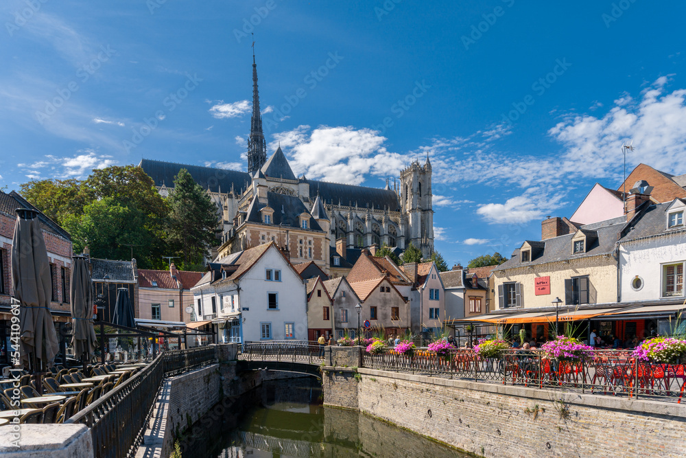 the canals of the Somme River and the historic old city center of Amiens with the cathedral in the background