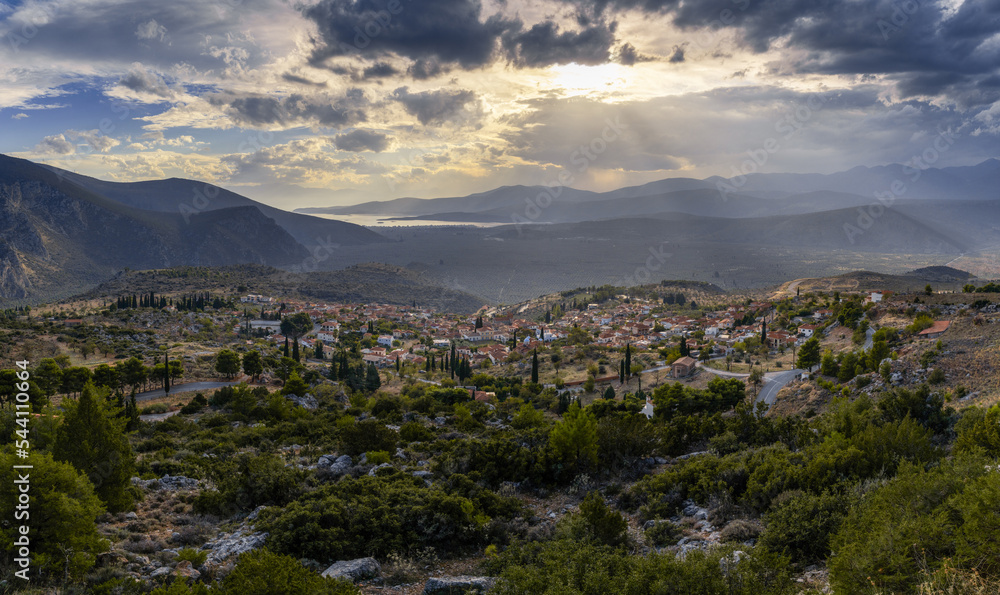 view of the village of Chrisso and the Crissaean Gulf in Central Greece after an evening thunderstorm