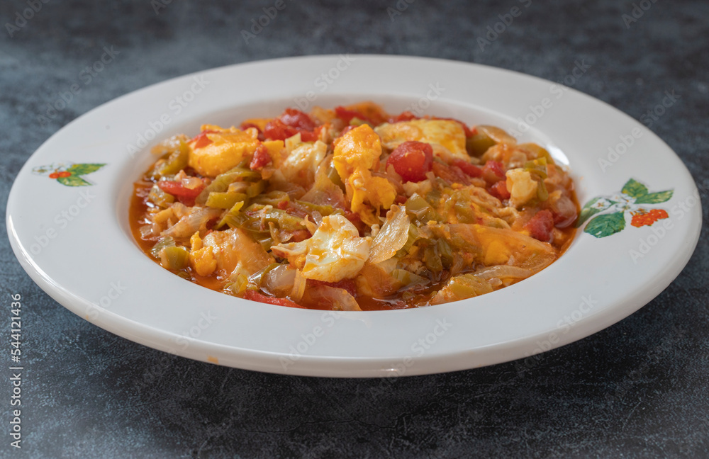 Traditional turkish food menemen made by eggs and tomatoes. Traditional turkish food menemen made by eggs and tomatoes.