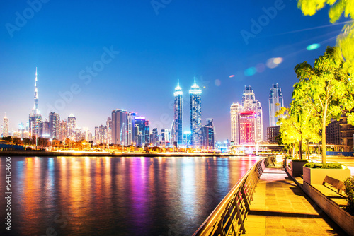 Obraz na płótnie Beautiful incredible cityscape with skyscrapers in the old town next to the Tolerance bridge near the water cana in Dubai, United Arab Emirates. w salonie