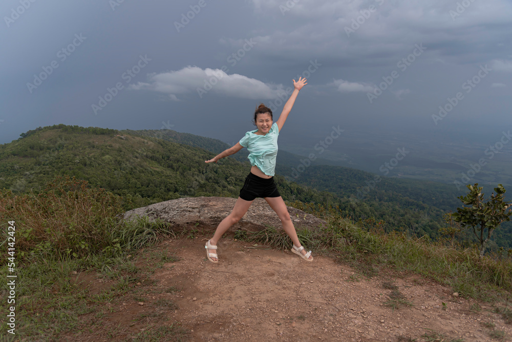 Woman travel hiker adventure on mountain nature landscape standing mountain outdoor adventure and leisure travel and relaxing destination in nature park vacation travel Woman travel hiker adventure on mountain nature landscape standing mountain outdoor adventure and leisure travel and relaxing destination in nature park vacation travel