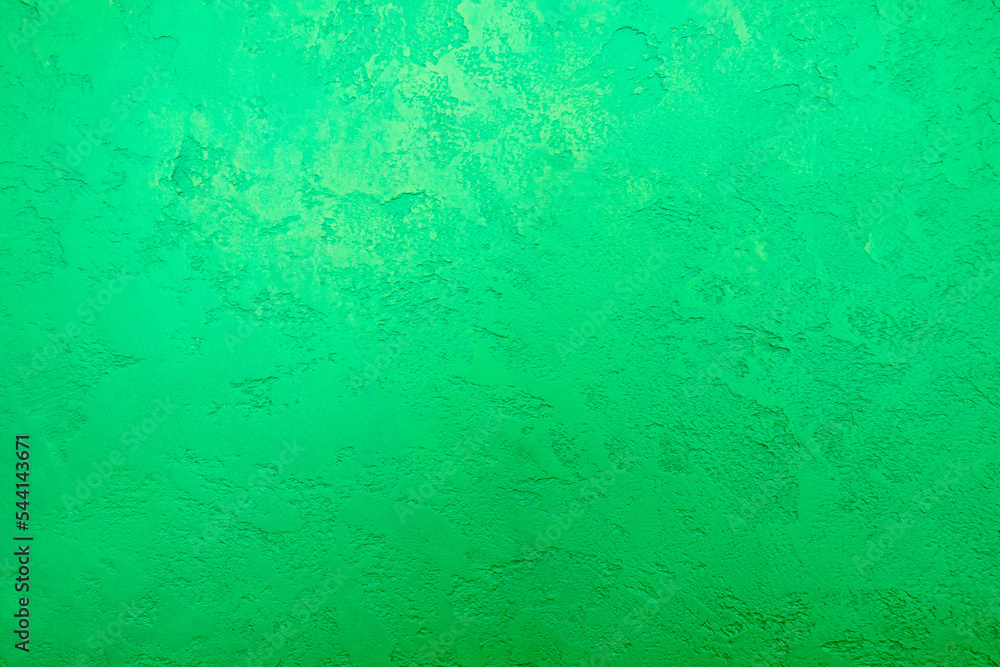 Fototapeta premium green background, decorative plaster on the wall