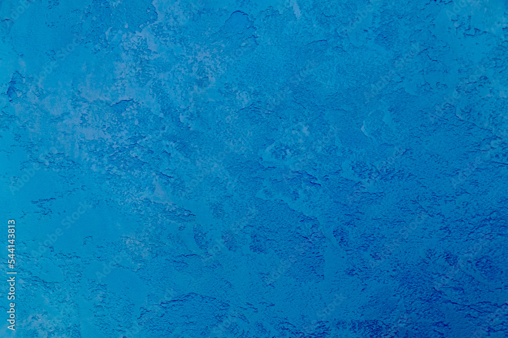 Blue background, texture of decorative plaster