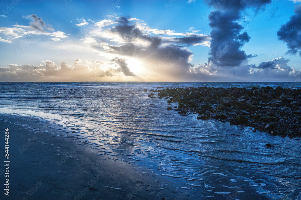 Fototapeta premium Sun sets over the island of Ameland, Holland