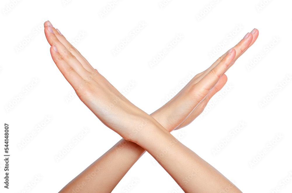 Female crossing hands forming an x isolated on white