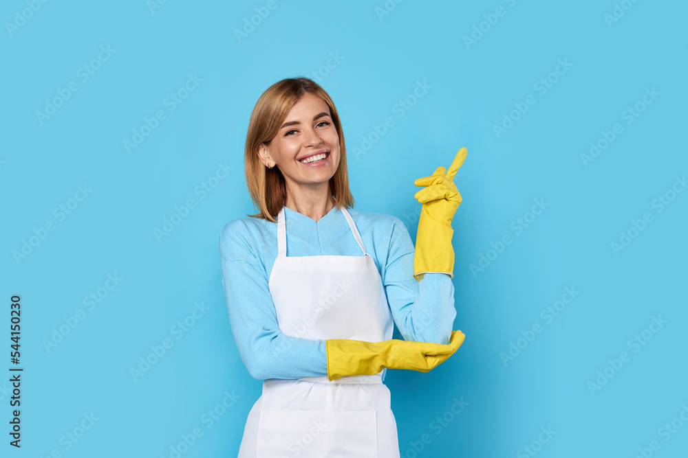 woman in gloves pointing fingers at copyspace woman in gloves pointing fingers at copyspace