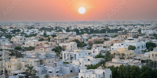 Doha city bird view during the daytime, onaiza residential area with many Arab traditional houses..