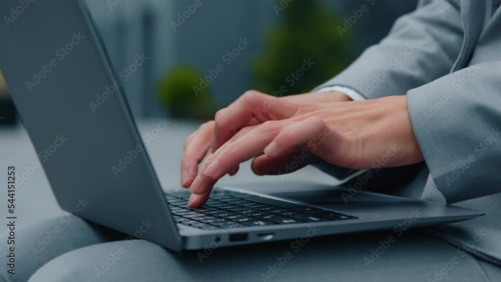 Close-up female hands typing on laptop business woman freelancer working remotely outdoors sending text message via email chatting with client online browsing information on internet distance learning Close-up female hands typing on laptop business woman freelancer working remotely outdoors sending text message via email chatting with client online browsing information on internet distance learning