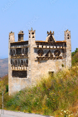 Fotografie In the Cyclades, in the heart of the Aegean Sea, Tinos is an island with many dovecotes scattered throughout its varied landscape