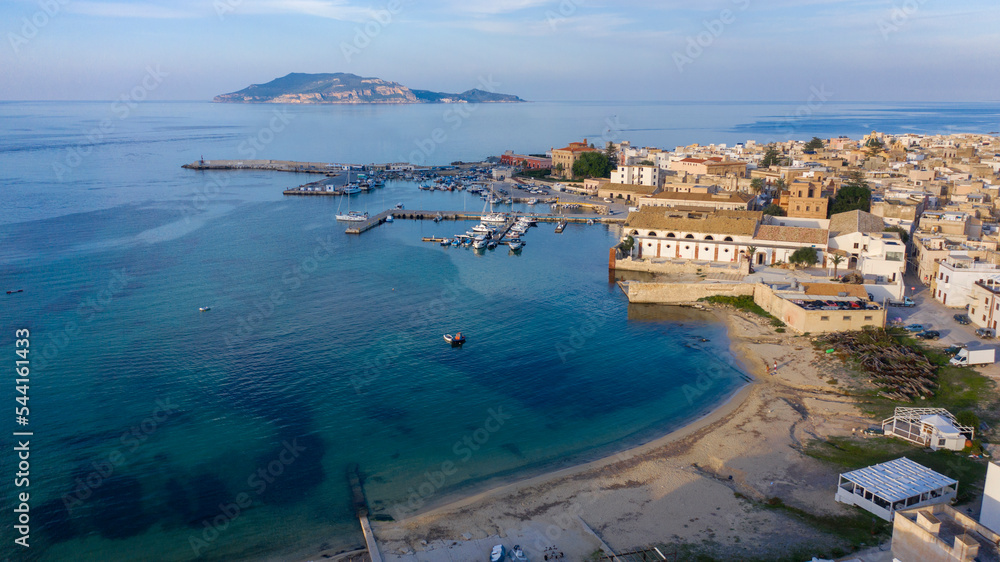 Aerial view at sunset on the island of Favignana. It's an Italian island belonging to the archipelago of the Aegadian islands, in Sicily, Italy. On background there is the Levanzo island.