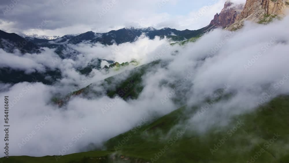 AERIAL: Beautiful steep cliffs shrouded in airy clouds. The Likoran plateau AERIAL: Beautiful steep cliffs shrouded in airy clouds. The Likoran plateau