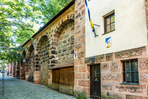 Huebnerstor city gate and tower in the historic city of Nuremberg in Germany.