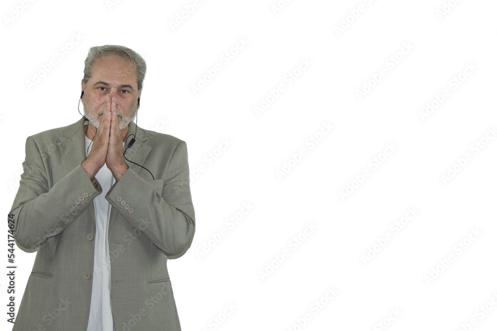mature man with headphones and beard in suit pray on a white background