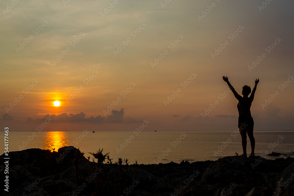Fototapeta premium silhouette of a person in sunset